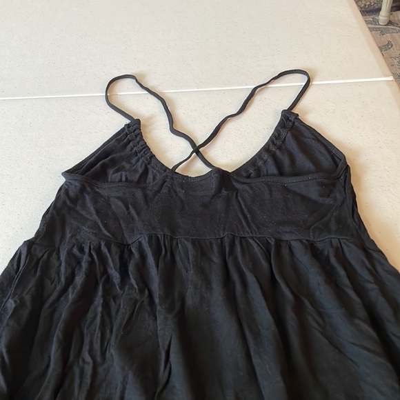 Black shirt. With straps that criss cross in the back. Sz small - Picture 4 of 7